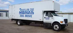 2 Guys on the Move Logo